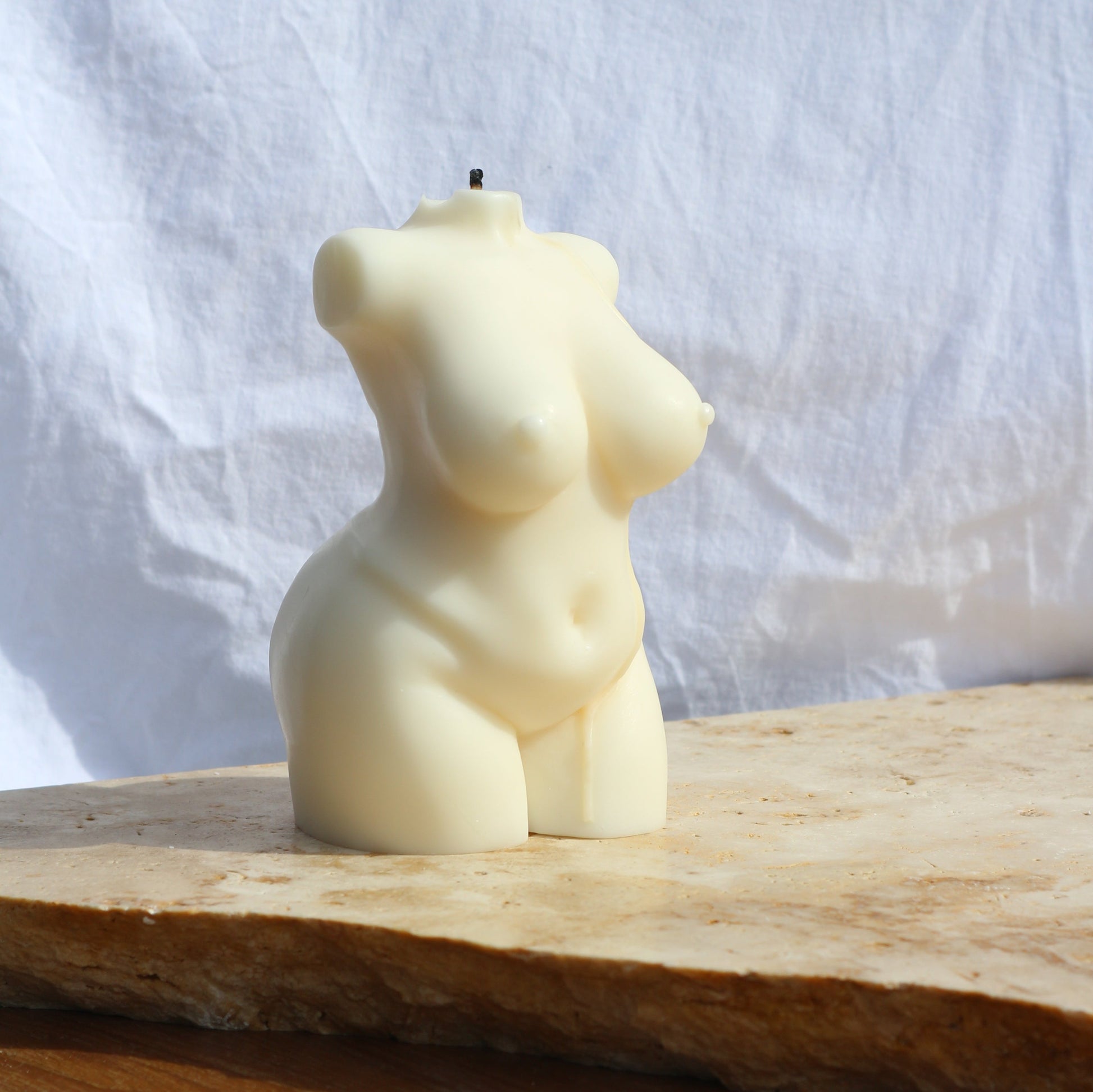 peachy female body torso sculptural soy wax candle